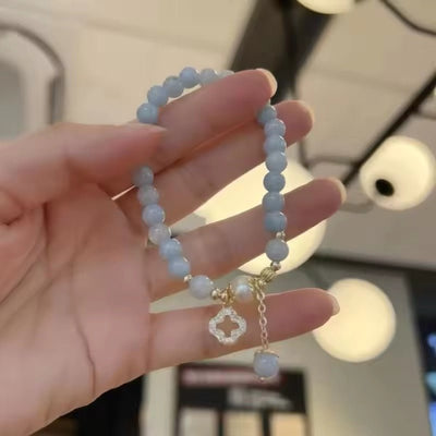 Grey Crystal Bead Bracelet with Leaf Clover Pendant - bellissi