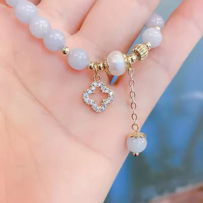 Grey Crystal Bead Bracelet with Leaf Clover Pendant - bellissi