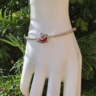 Multicoloured Santa Sleigh Charm - bellissi