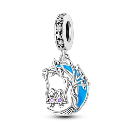 Sisters Friends On A Swing Luminous Moon Charm - bellissi