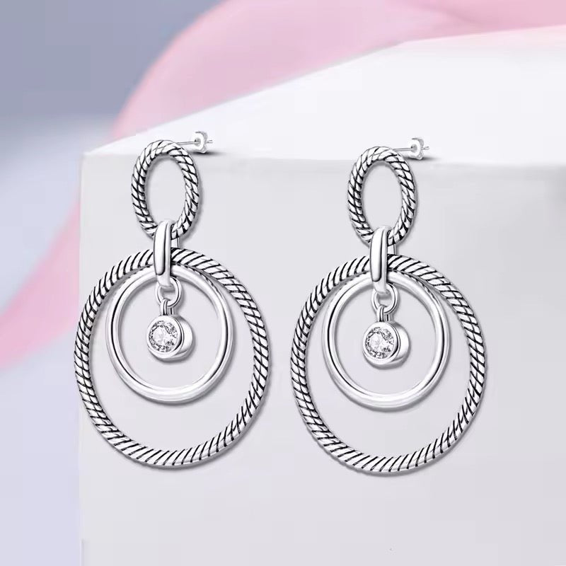 Sparkling Zircon in Double Circle Stud Earrings - bellissi