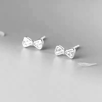 Sparkling Zirconia Bow Stud Earrings - bellissi