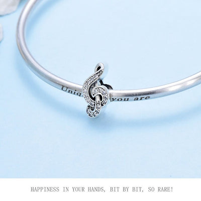 Sparkling Zirconia Treble Clef Charm - bellissi