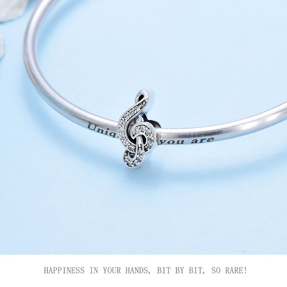 Sparkling Zirconia Treble Clef Charm - bellissi