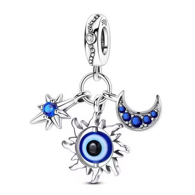 Sterling Silver Evil Eye Sun Moon Star Charm - bellissi