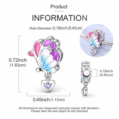 Silver butterfly charm with pink, blue, and purple enamel details and a heart-shaped purple crystal pendant, shown with product dimension measurements on a white background.