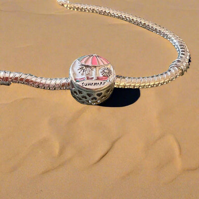 Summer palm tree charm with green enamel leaves and silver trunk