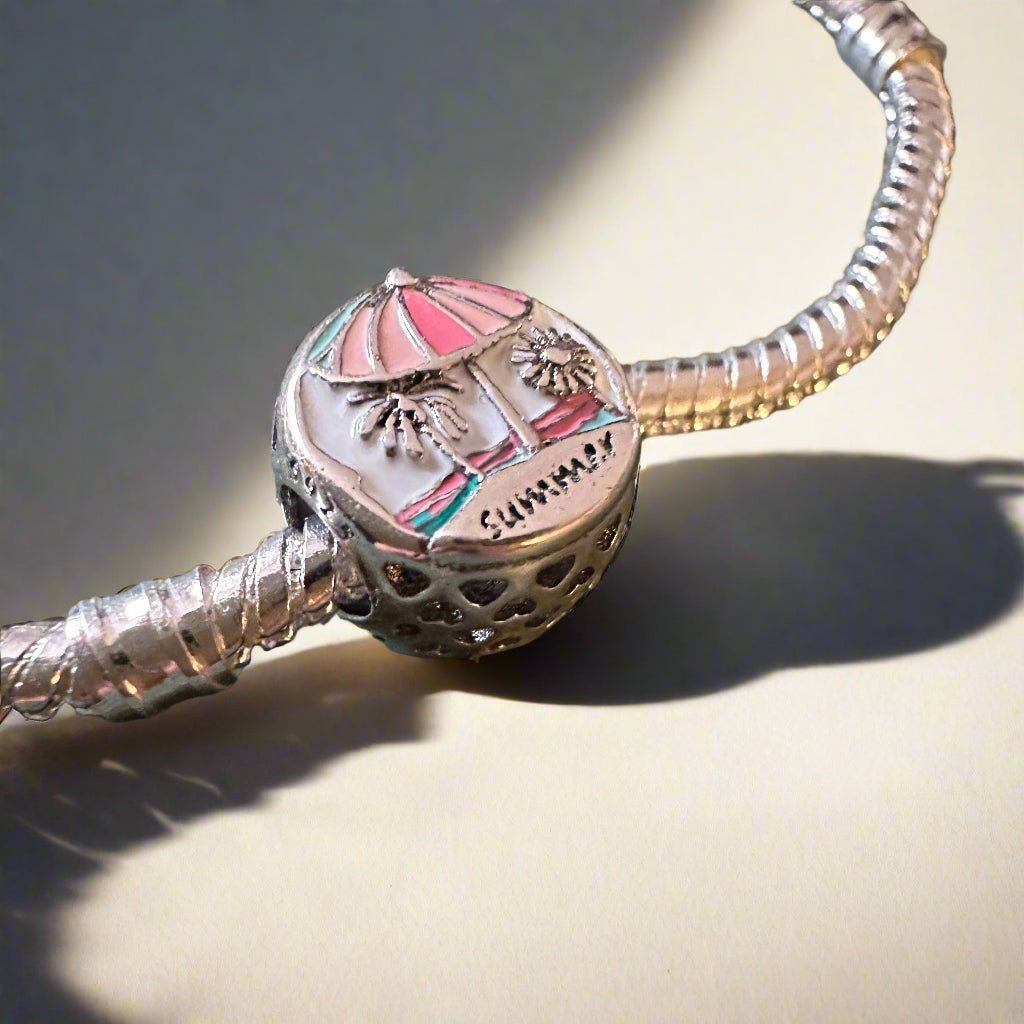 Summer palm tree charm with green enamel leaves and silver trunk