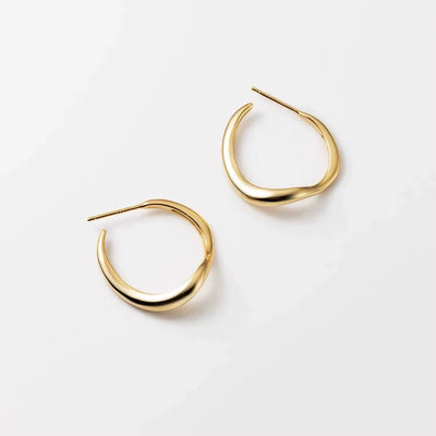 modern Waveform earrings — sleek silver curved earrings inspired by sound waves